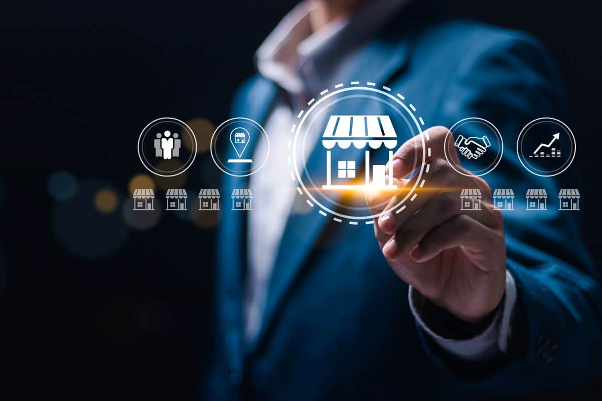 Businessman touching virtual franchise business icon