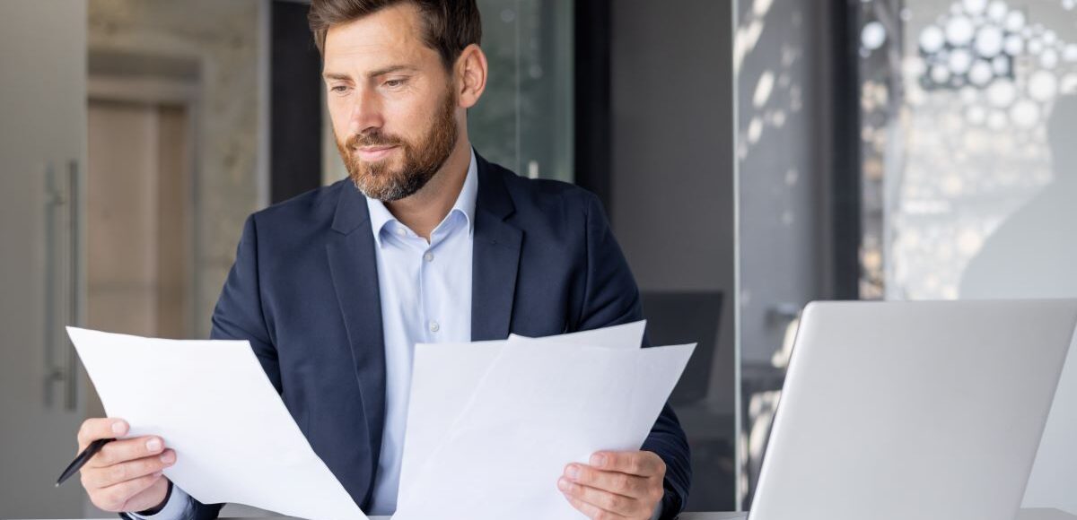 Businessman looking at documents